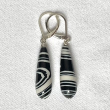 Load image into Gallery viewer, Reconstructed Agate in a swirl pattern in black and white - 22mm.  Complete with Sterling Silver lever backs.

