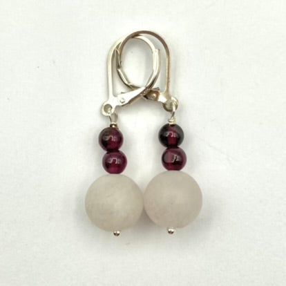 Frosted Rose Quartz balls (10mm) with Garnet accent (4mm) earrings, complete with Sterling Silver lever backs.