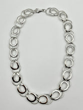 Load image into Gallery viewer, Sterling Silver loop lnked together to form a 20&quot; necklace.  Available with matching earrings
