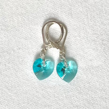 Load image into Gallery viewer, Pale blue Swarovski heart earrings - 10mm, complete with Sterling Silver lever backs.
