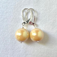 Load image into Gallery viewer, 12 mm Preciosa Pearls in Pearlescent Yellow, complete with Sterling Silver lever backs.

